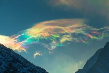 Breathtaking Rainbow Clouds Caught on Siberian Peak: Stunning Mother Nature
