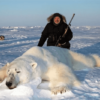 Trophy Hunters Pose With Dead Polar Bears In Company Ad Offering $44,000 Hunting Trips