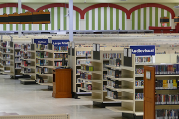 A Stunning Supermarket-Turned-Library Features Aisles & Freezers Stocked with Books