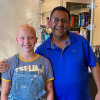 Bagel Shop Owner Shaves His Head to Show a Loyal Customer that She Is Not Alone
